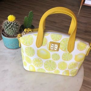 Adorable lemon Dooney and Bourke crossbody bag